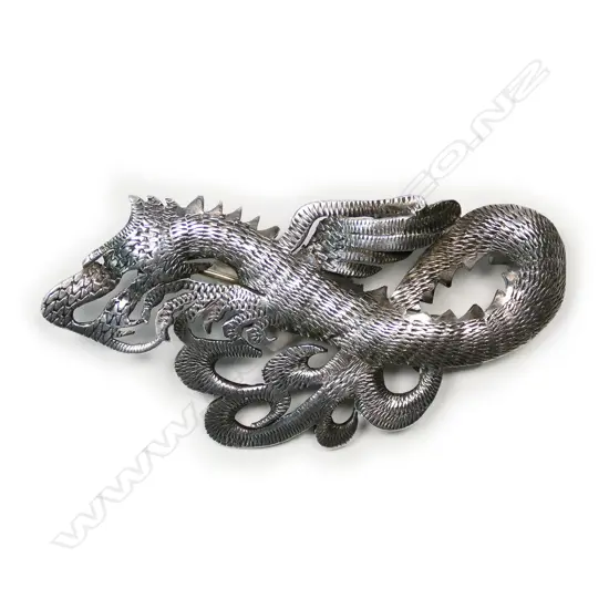 A vintage silver Patoni (Tony Buller) dragon brooch,