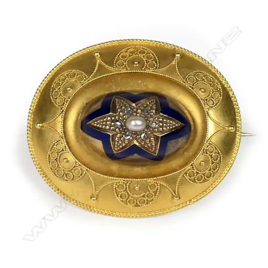 A stylish Victorian 15ct to 18ct gilded gold pearl and diamond set brooch,