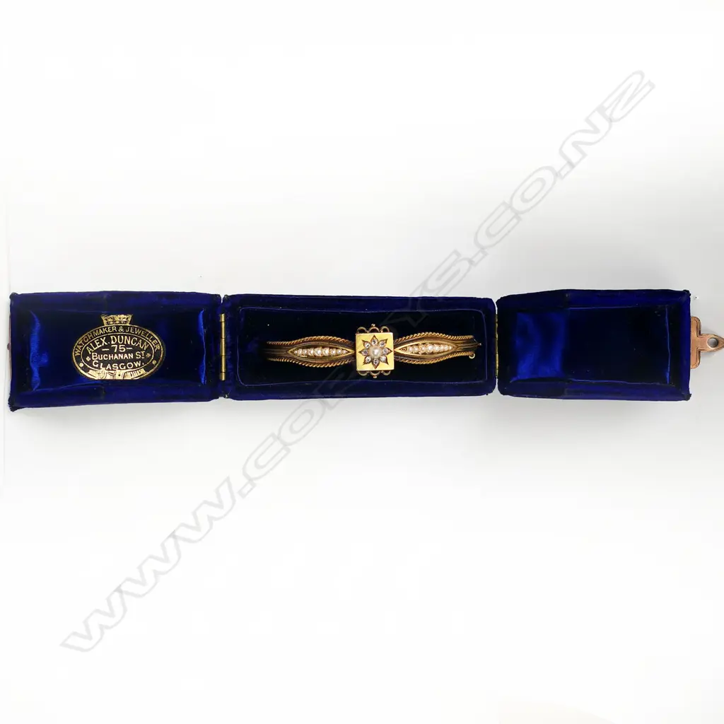 A Victorian 15ct gold diamond and seed pearl hinged bangle, Image 1++