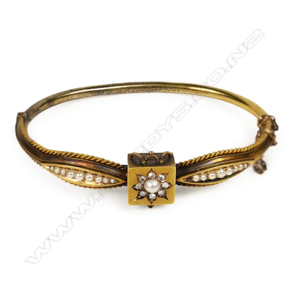 A Victorian 15ct gold diamond and seed pearl hinged bangle, Image 1++