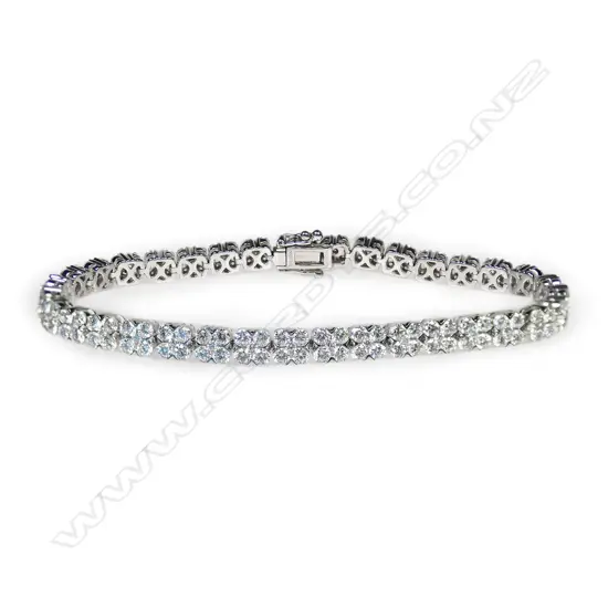 An 18ct white gold and multi diamond tennis bracelet,