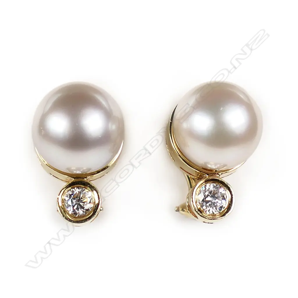 A pair of 14ct gold pearl and diamond earrings, Image 1++