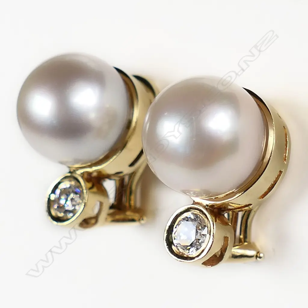 A pair of 14ct gold pearl and diamond earrings, Image 1++