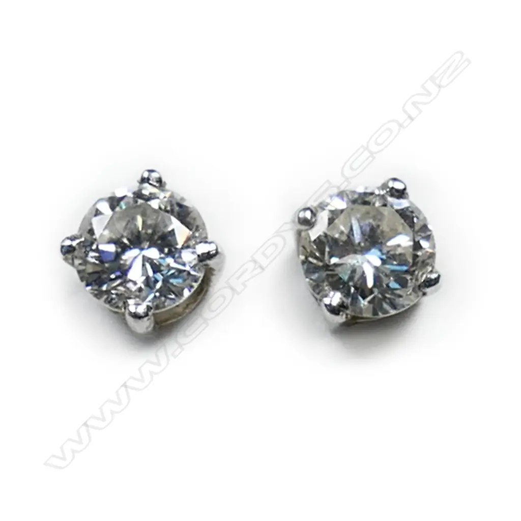 A pair of 18ct white gold and diamond earrings, Image 1++