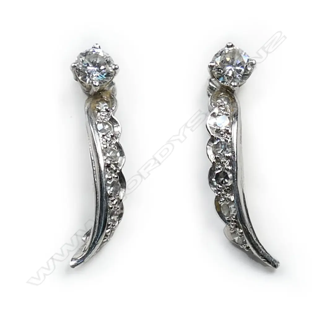 A pair of 18ct white gold and diamond earrings, Image 1++