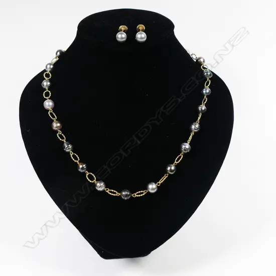 A 9ct gold and black pearl necklace and earrings set,