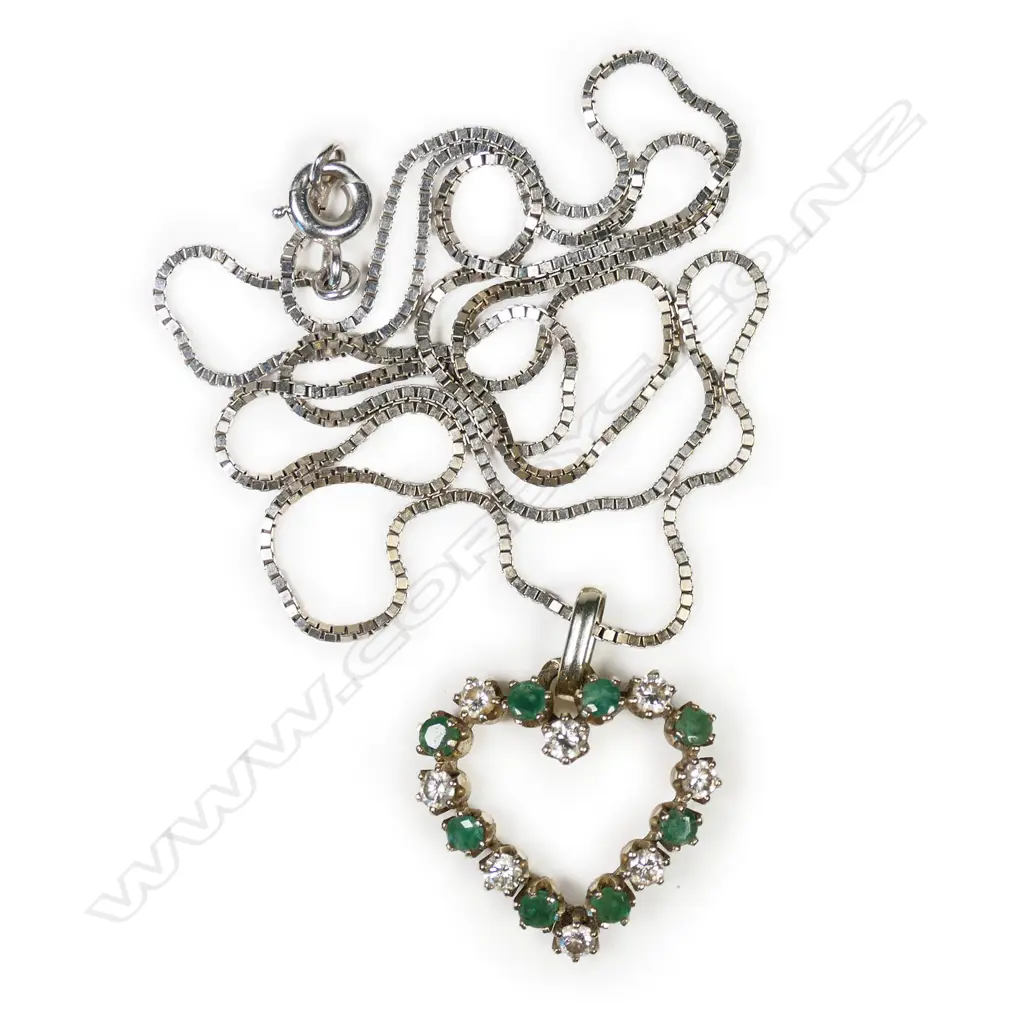 An 18ct white gold diamond and emerald pendant, Image 1++
