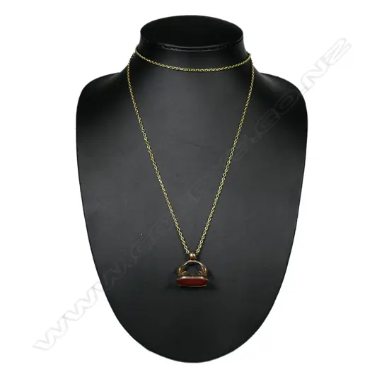 An antique 9ct gold and gold plate fob seal,