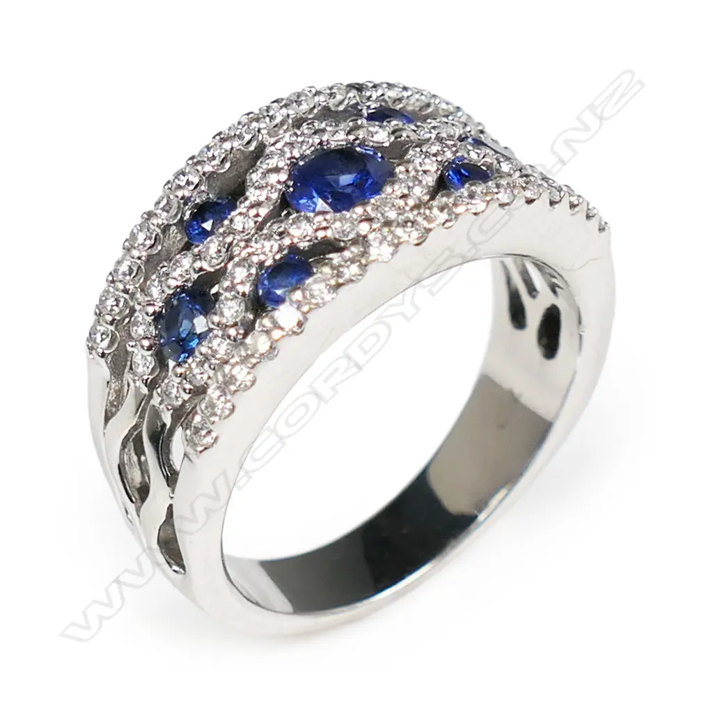 An 18ct white gold sapphire and diamond ring, Image 1++