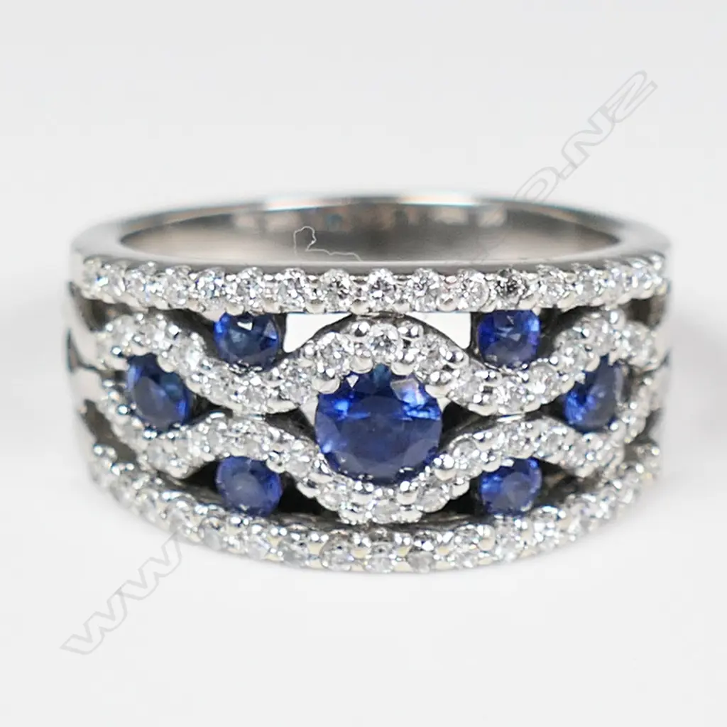 An 18ct white gold sapphire and diamond ring, Image 1++