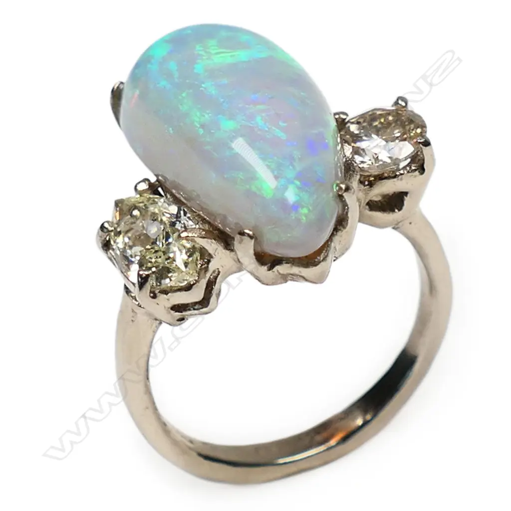 An 18ct white gold opal and diamond ring, Image 1++