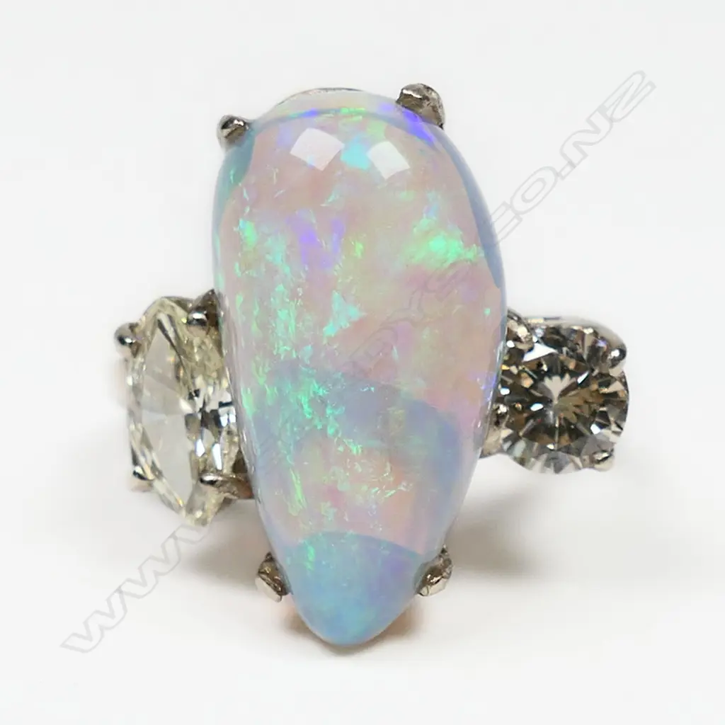 An 18ct white gold opal and diamond ring, Image 1++