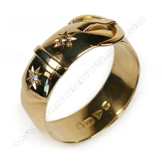 A 1915 18ct yellow gold and diamond buckle ring,