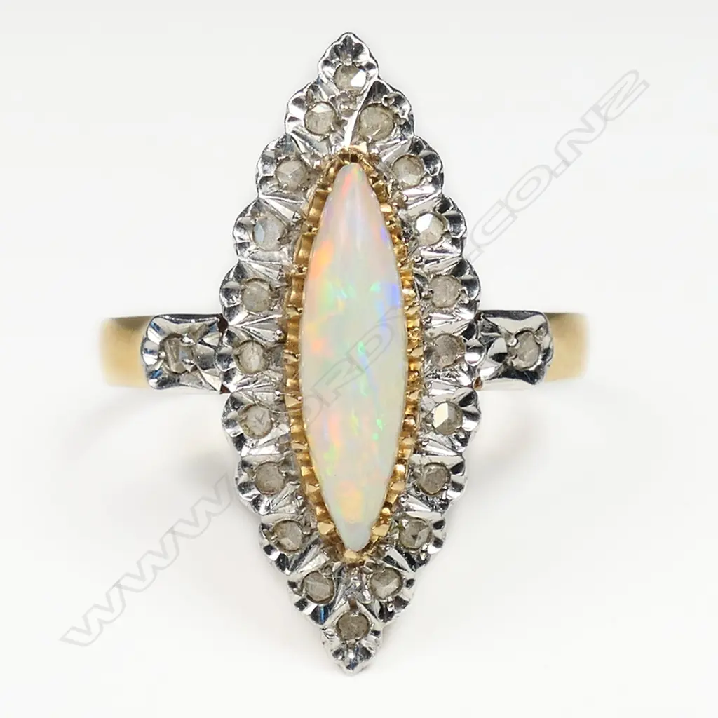 An 18ct gold opal and diamond ring, Image 1++