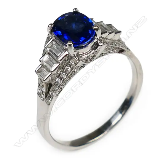 An 18ct white gold sapphire and diamond ring,