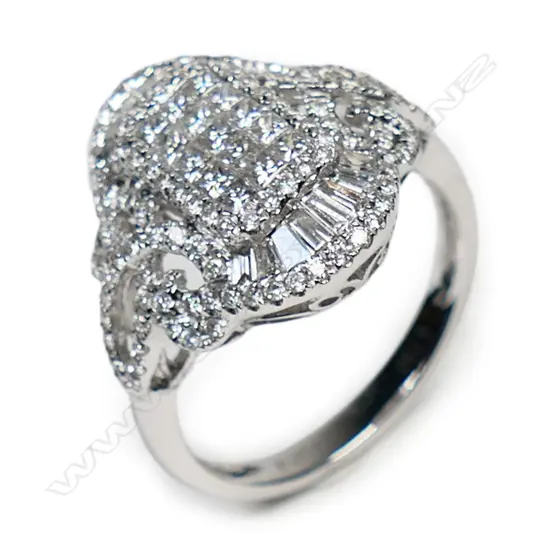 An 18ct white gold and diamond cluster ring,