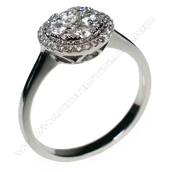 An 18ct white gold and diamond cluster ring,