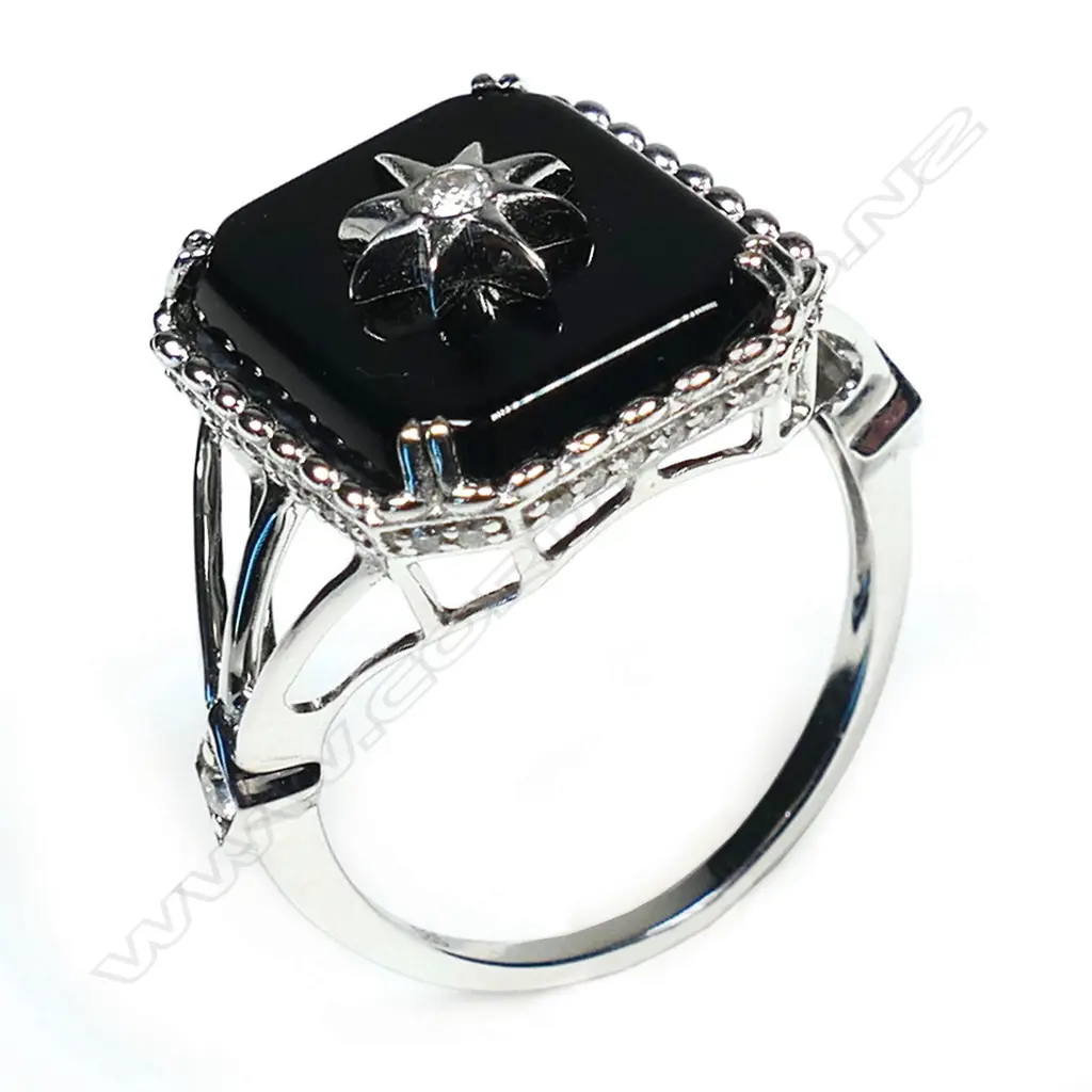 A 14ct white gold black onyx and diamond Art Deco style ring, Image 1++