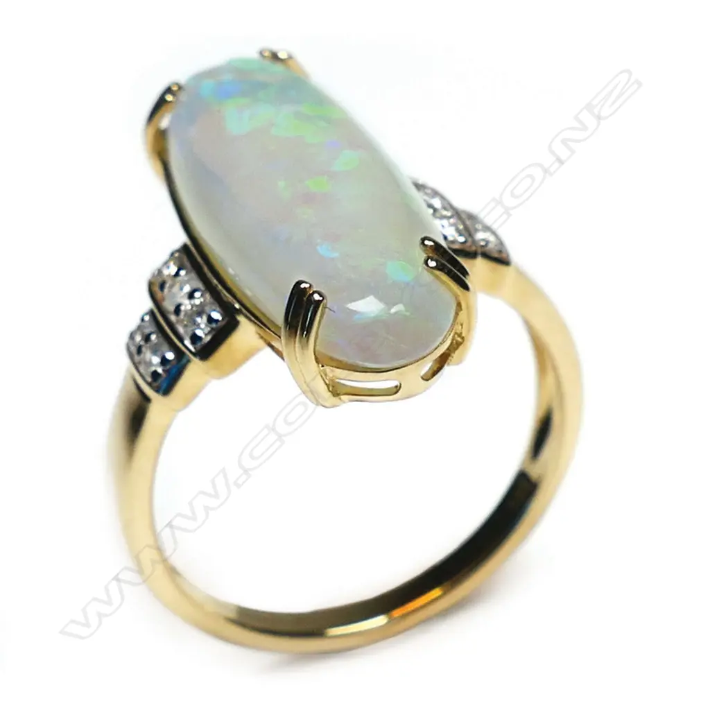 A 14ct gold opal and diamond trilogy style ring, Image 1++