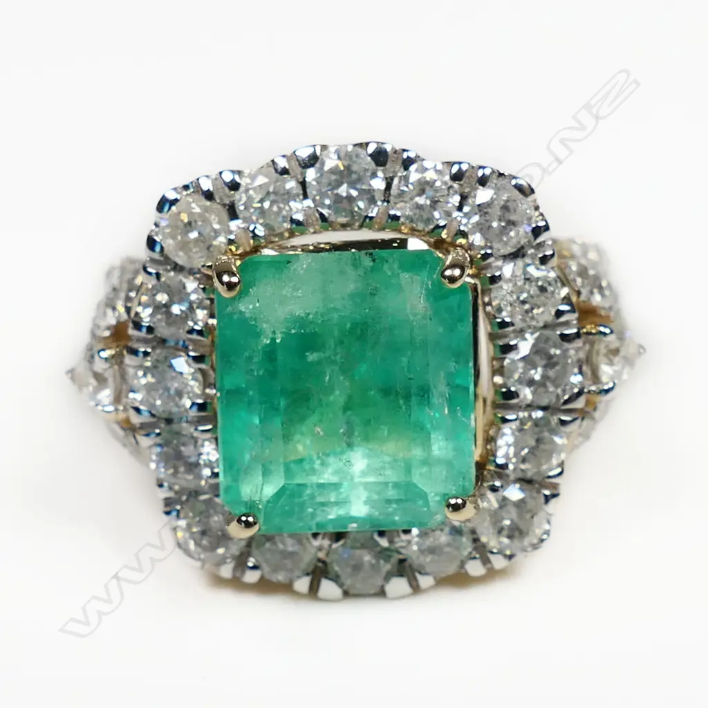 A 14ct gold Colombian emerald and diamond cluster ring, Image 1++