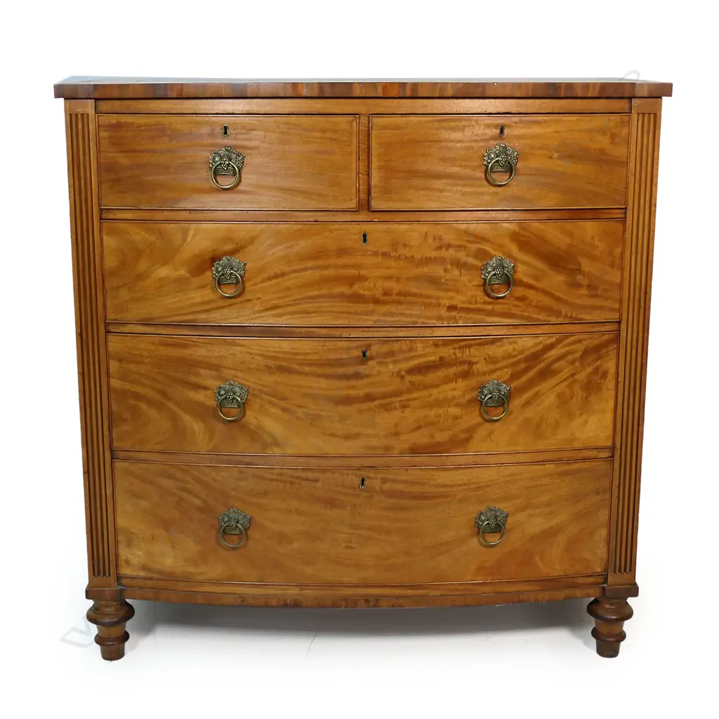 A Regency mahogany bow front chest of five drawers, Image 1++