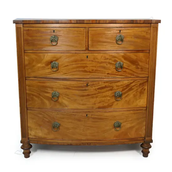 A Regency mahogany bow front chest of five drawers,
