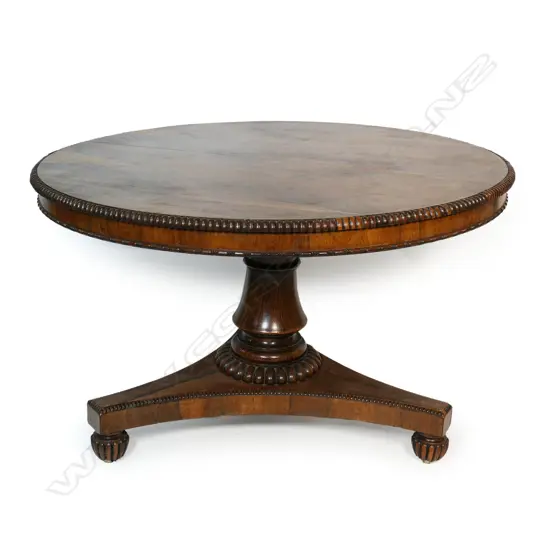 A William lV round rosewood supper table,