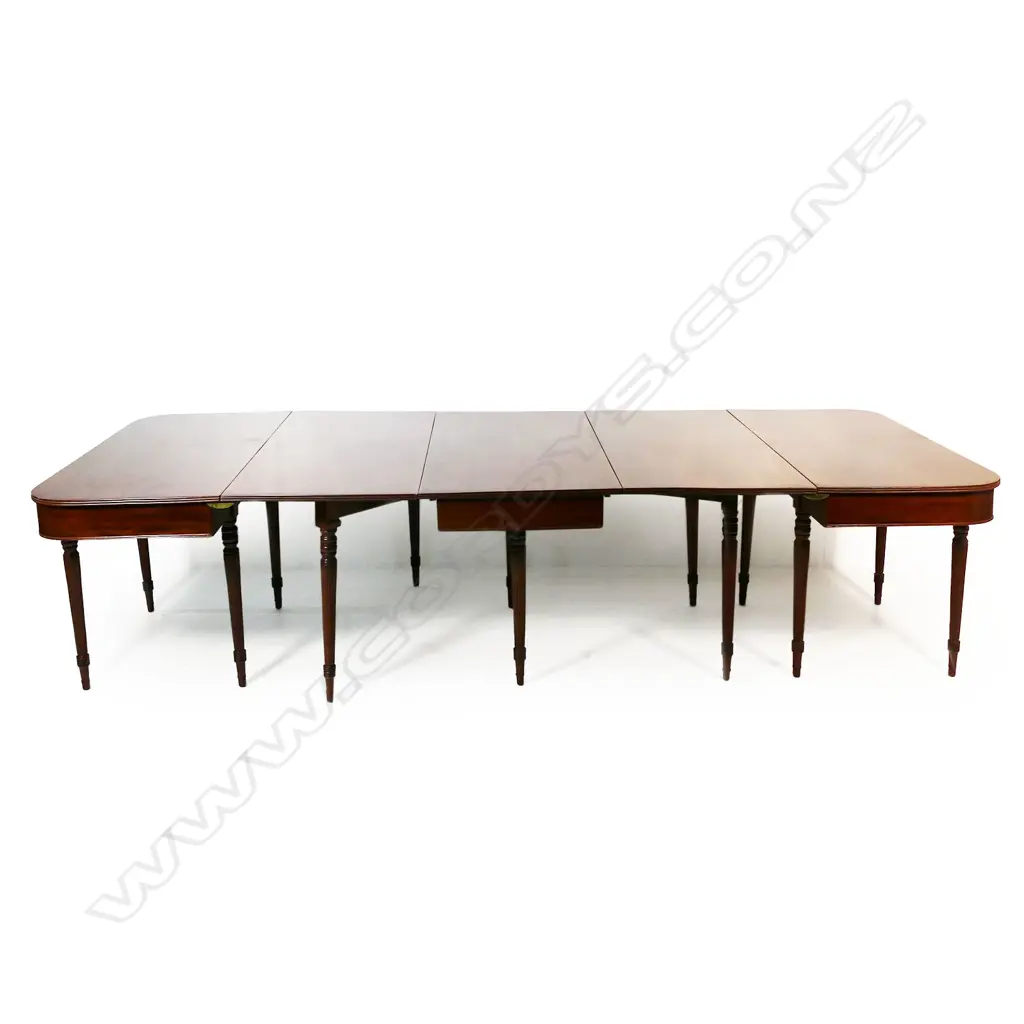 A late Georgian mahogany drop leave D-end dining table, Image 1++