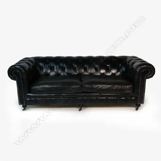 An 'Artsome' black leather 'Hampton Court two-seater Vintage Cigar' couch,