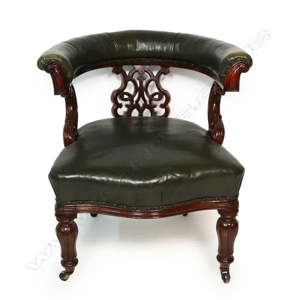 A Victorian mahogany and leather upholstered desk chair, Image 1++