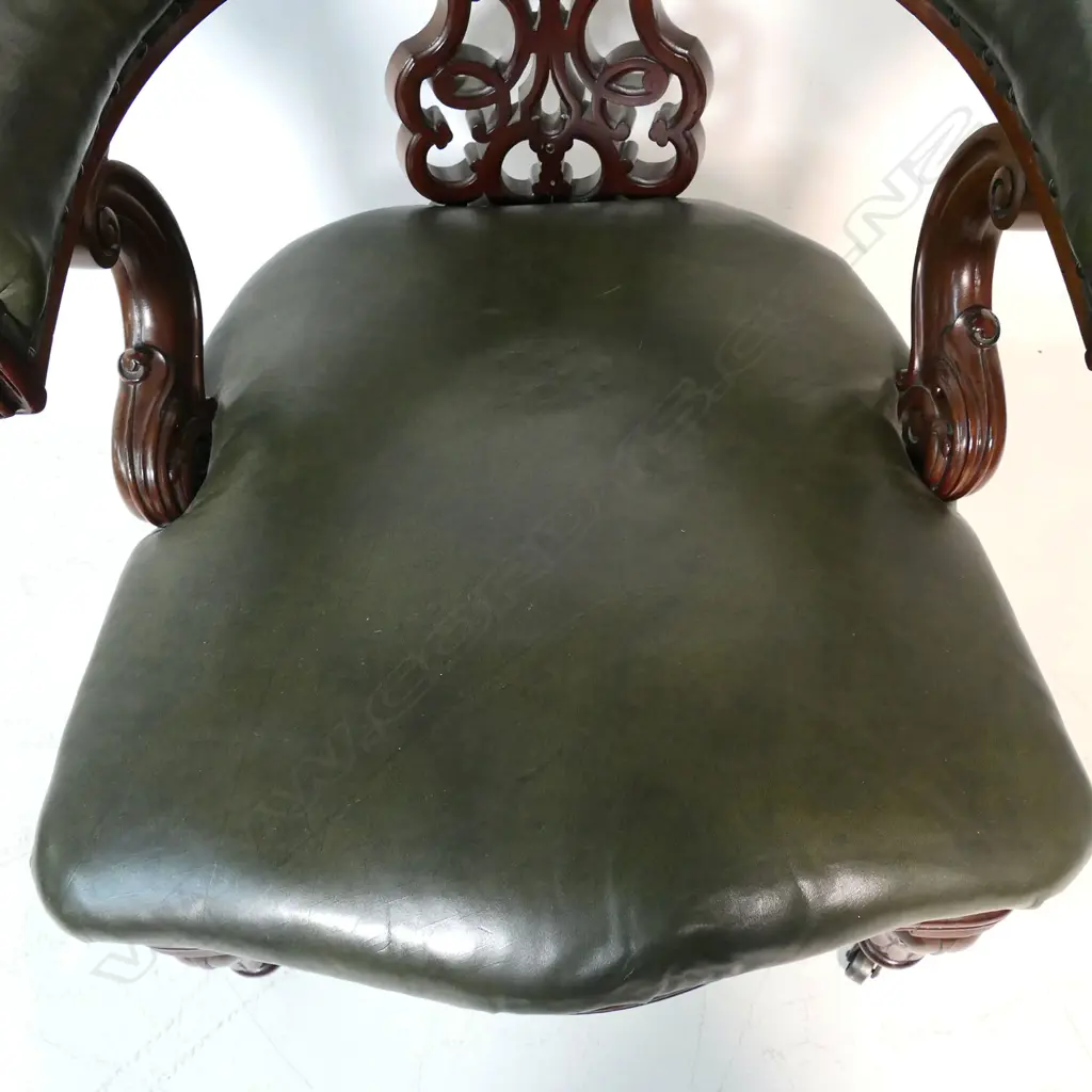 A Victorian mahogany and leather upholstered desk chair, Image 1++