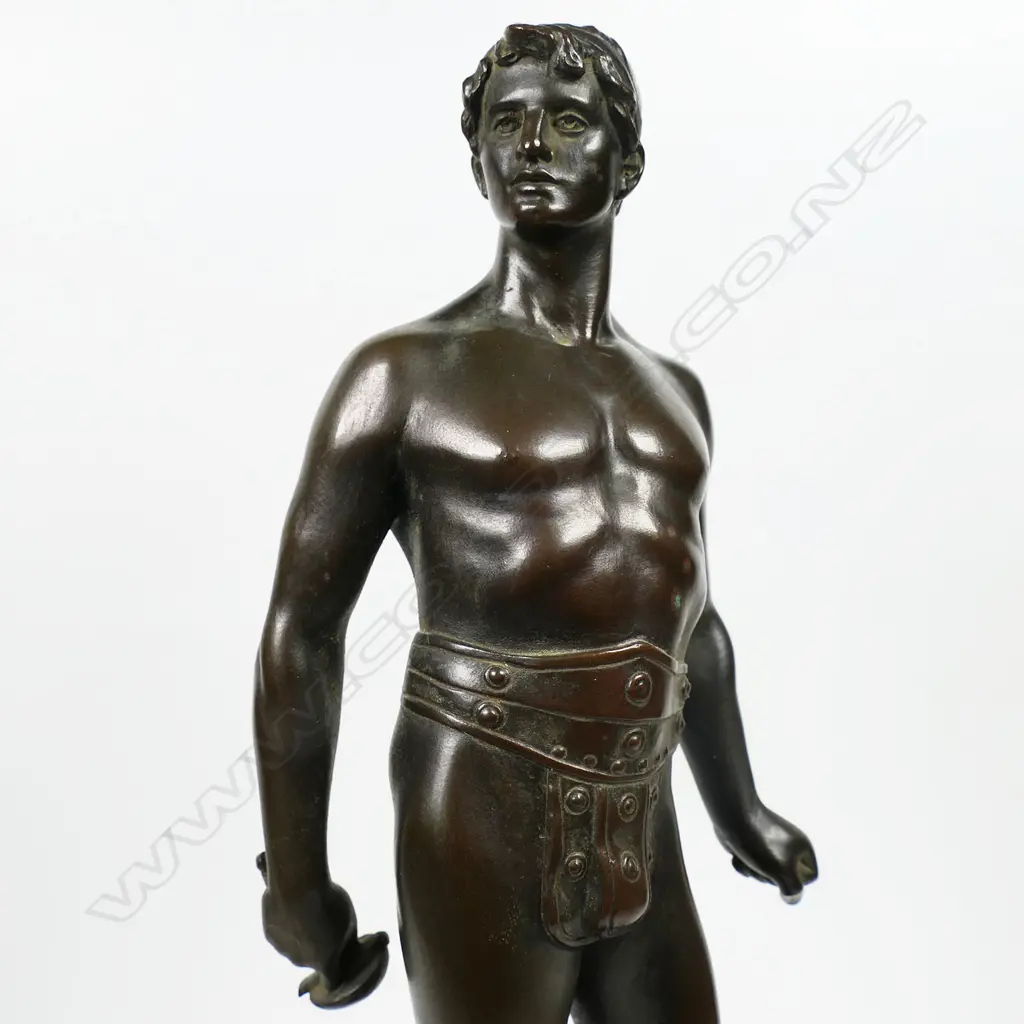 Early 20thC bronze attributed to Rudolf Kuchler ‘Veni - Vidi - Vici’ - depicts a warrior in repose looking right with the famous words of Julius Caesar cast to the base ‘Veni, Vidi, Vici’ - I came, I saw, I conquered. Mounted to a square marble plinth. H.310mm. Image 1++