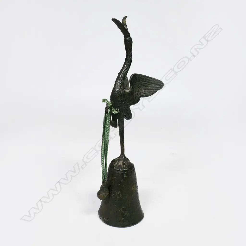 A bronze Pompeian stork bell - known for the clapper outside the bell. The bell is a copy of the original found during excavations of Pompeii. H.230mm. Image 1++