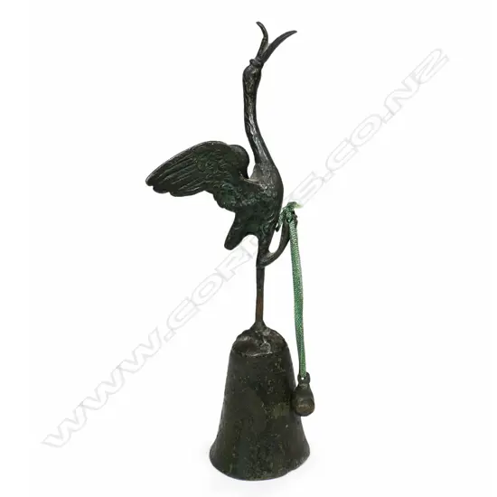 A bronze Pompeian stork bell - known for the clapper outside the bell. The bell is a copy of the original found during excavations of Pompeii. H.230mm.