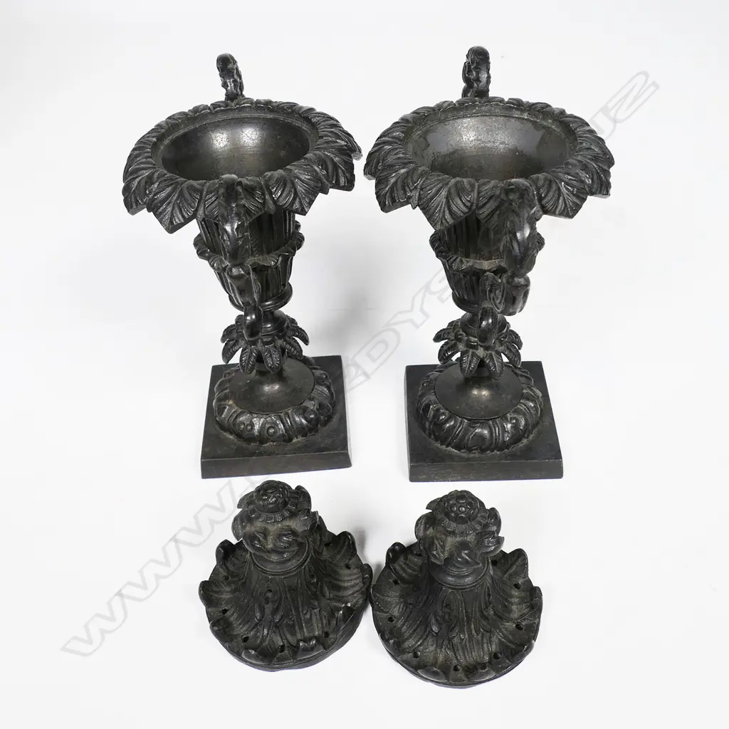 A pair of Regency period bronze pastille burners, of campana urn shape - with acanthus capped scroll handles and raised on palm frond knopped columns from square plinth bases. The covers with conforming palm fronds and foliate finials. H.190mm, Image 1++
