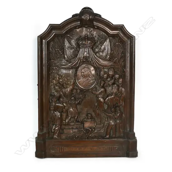 A late Victorian solid bronze plaque - celebrating '60 Years Of Glorious Reign' of Queen Victoria, 1837-1897. Decorated in relief with various military and other figures admiring her portrait plaque under a crowned pelmet and flags. Signed by the sculptor C Caccia. 640 x 430mm.