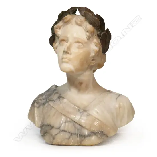 A large carved marble bust of a woman - with laurel wreath about her head, looking upwards, signed Giussepe Bess. Professional repair to nose. H.550mm.