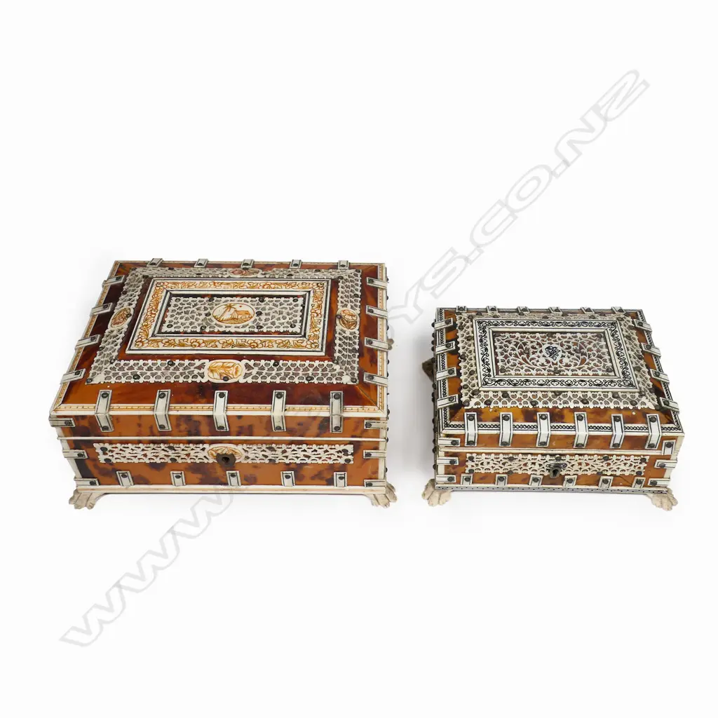 Two antique vizagapatam tortoiseshell and ivory boxes - the ivory with engraved and coloured decoration, the interiors lined, one with a mirror to the lid. Both raised on paw feet. Some old damage. 150 x 120 x 80mm and 120 x 100 x 65mm. Image 1++