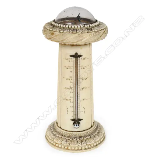 An uncommon William IV carved ivory desk top combination sundial compass thermometer - with paper plateau, signed 'C Essex & Co, London' under glass dome, the tapered column with glass thermometer framed by engraved scale. The top and base rims with panel carved, leaf and bead decoration. H.160mm.