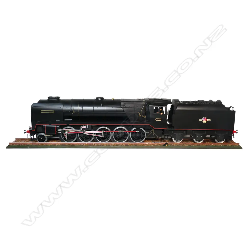 A large cased model of a steam train 'Evening Star 92220’ - on realistic track, together with a book and print. 1850 x 240 x 455mm. Provenance: Made by John Borrows, an Auckland engineer who was the brains behind Fisher & Paykel's revolutionary SmartDrive washing machine. In Mr Borrows’ spare time he was a model maker. Image 1++