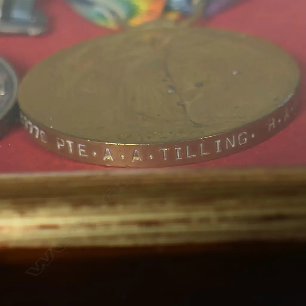 A WWI medal group to 57776 PTE A.Tilling. RAMC - framed with photographs of two RAMC privates below an RAMC cap badge. Overall 345 x 165mm, Image 1++