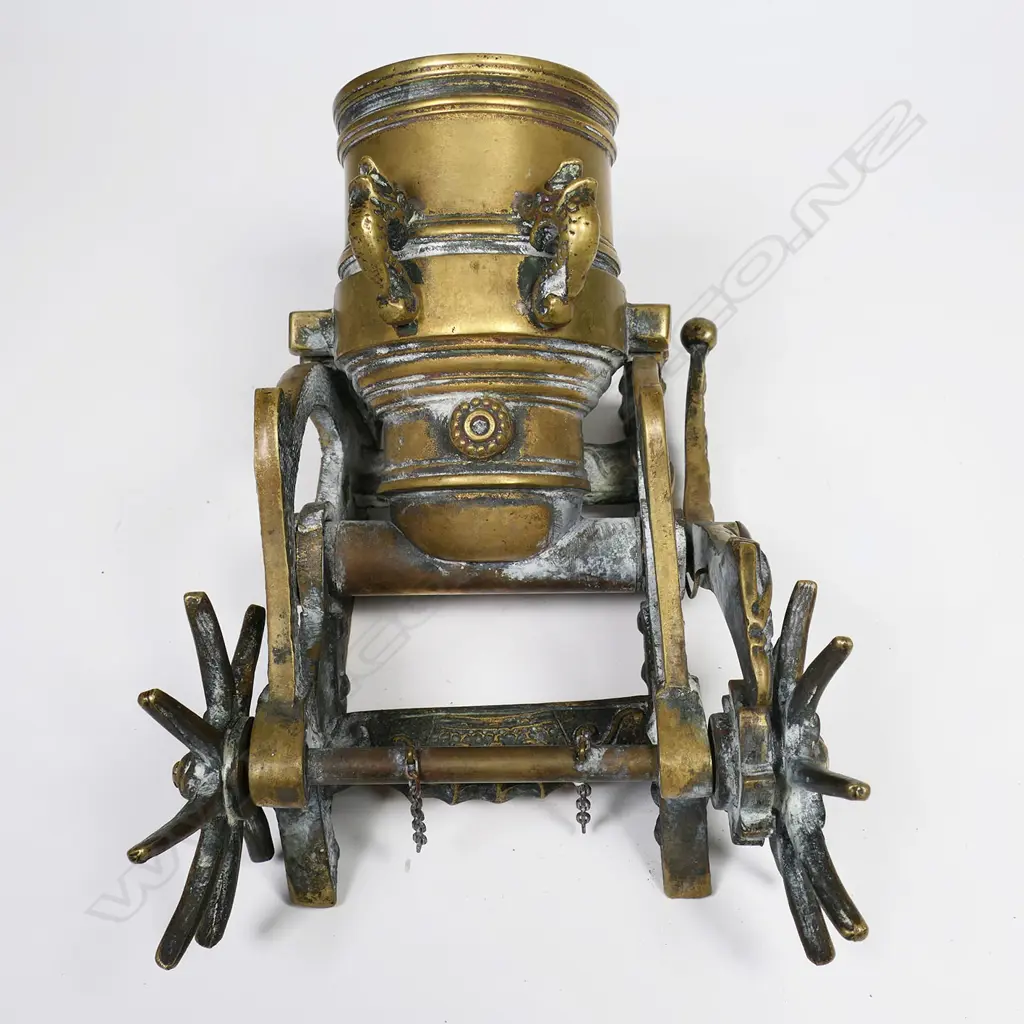 A French bronze model of a cannon à mortier (mortar cannon) signed M (Maxime) le Vérrier - the short and wide barrel supported in a simulated wooden frame, elevated by a ratchet system (chains broken). L.185mm, Image 1++