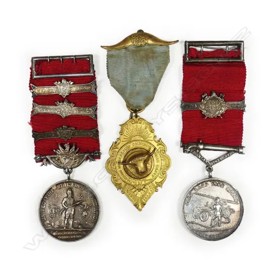 A rare set of medals to an Auckland fireman John Leslie Bernard Bishenden - of the Auckland Metropolitan Fire Brigade. Born 20 Mar 1926 and died at Howick 15 Jun 1970 (aged 44). 1963 dated UFBA Medal with 3 bars and very rare Auckland Fire Board Medal with one bar. Together with medal from the Buffalo Lodge