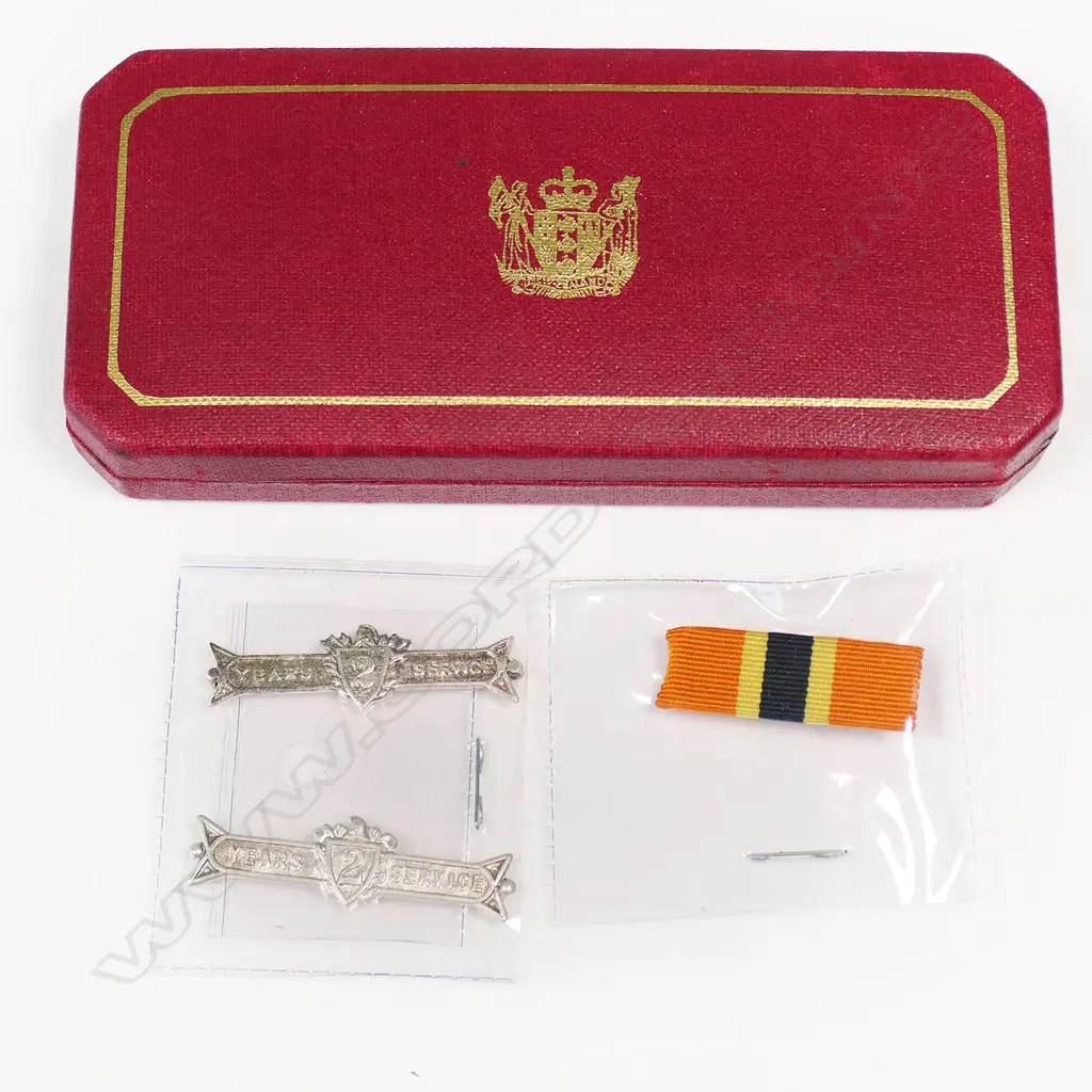 An interesting NZ Fire Brigade Long Service Medal - to R O Hilton of Christchurch, together with his UFBA Medal with 4 bars (2 fitted), this dated 1980. Image 1++