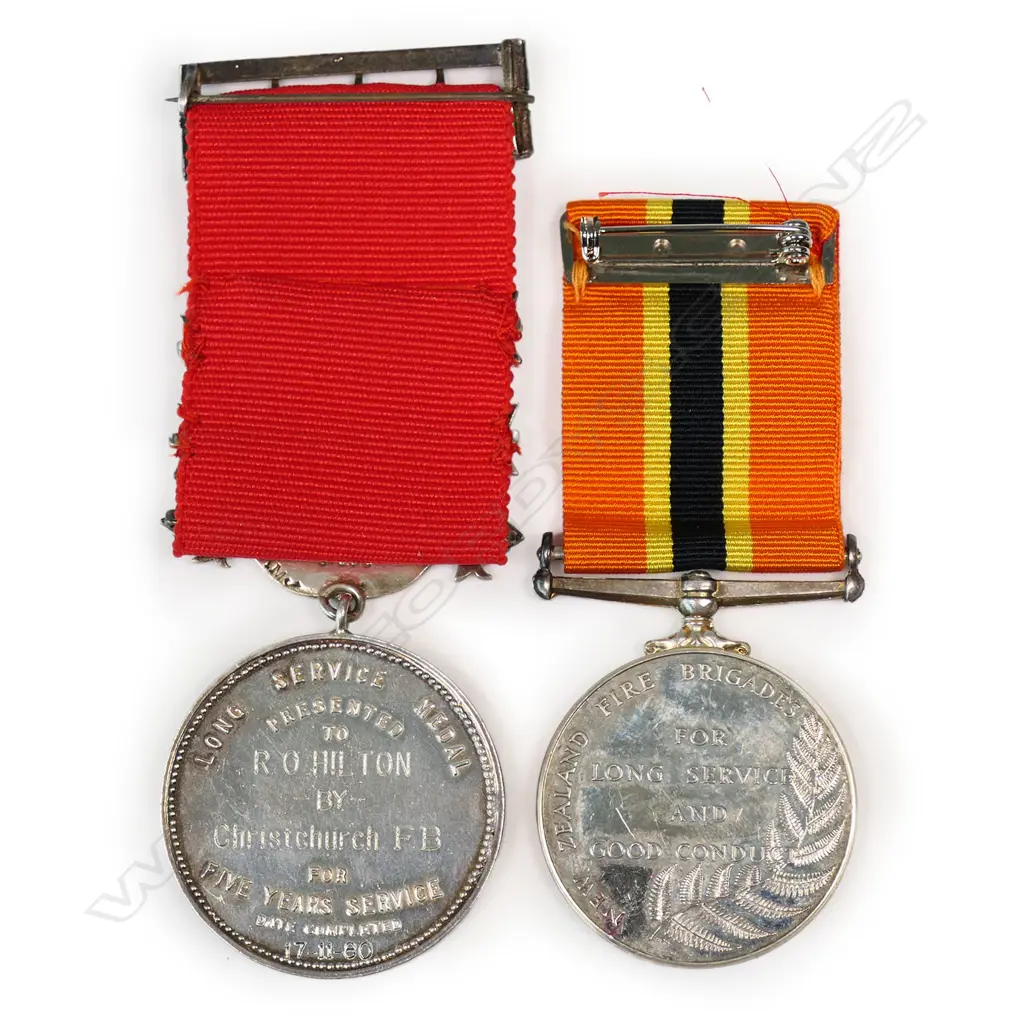 An interesting NZ Fire Brigade Long Service Medal - to R O Hilton of Christchurch, together with his UFBA Medal with 4 bars (2 fitted), this dated 1980. Image 1++