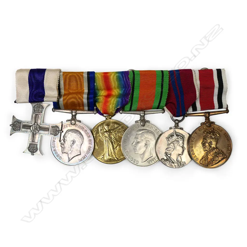 The medal group awarded to Lt. E.D. Cox R.F.A. including the Military Cross - the Military Cross with original box, together with WWI Pair, named to Lt. E.D. Cox, The Defence Medal and the 1953 Coronation medal. The group also with Special Constabulary Long Service Medal awarded to Lt. E.D. Cox's brother Keith T. Cox and named to him. Image 1++