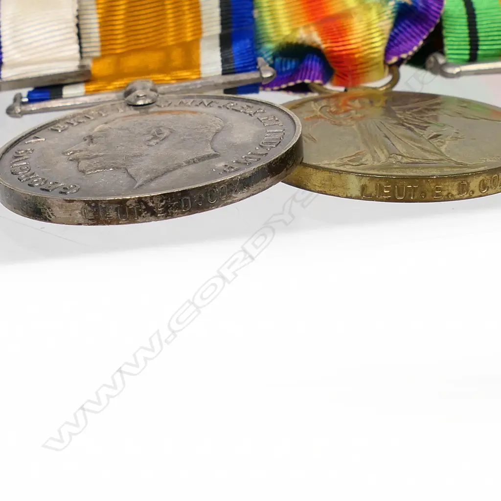 The medal group awarded to Lt. E.D. Cox R.F.A. including the Military Cross - the Military Cross with original box, together with WWI Pair, named to Lt. E.D. Cox, The Defence Medal and the 1953 Coronation medal. The group also with Special Constabulary Long Service Medal awarded to Lt. E.D. Cox's brother Keith T. Cox and named to him. Image 1++