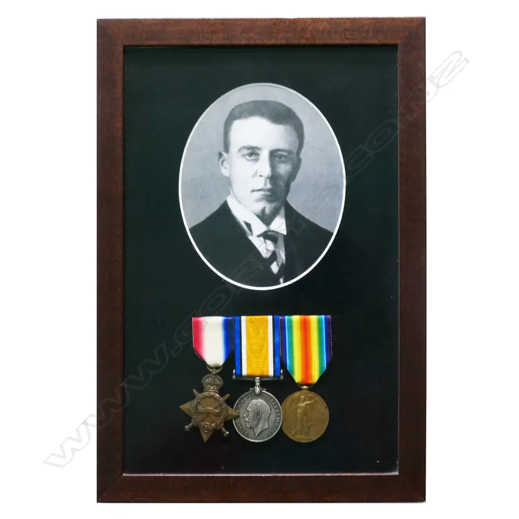 WW1 1914-15 trio of medals in modern frame - with copied photo, to 12/134 2/LT E HORROBIN NZEF. Edwin Horrobin enlisted in the Auckland Infantry in October 1914. He was a bank officer working in Auckland for the Bank of Australasia. He embarked as a Private and served with the Auckland Infantry at Gallipoli. He was later posted to HQ in London where he had clerical roles. He worked for the Bank of Australasia for 41 years, his last 12 years as manager in Napier (likely during the earthquake) before he retired in 1943. He died in 1963. Image 1++