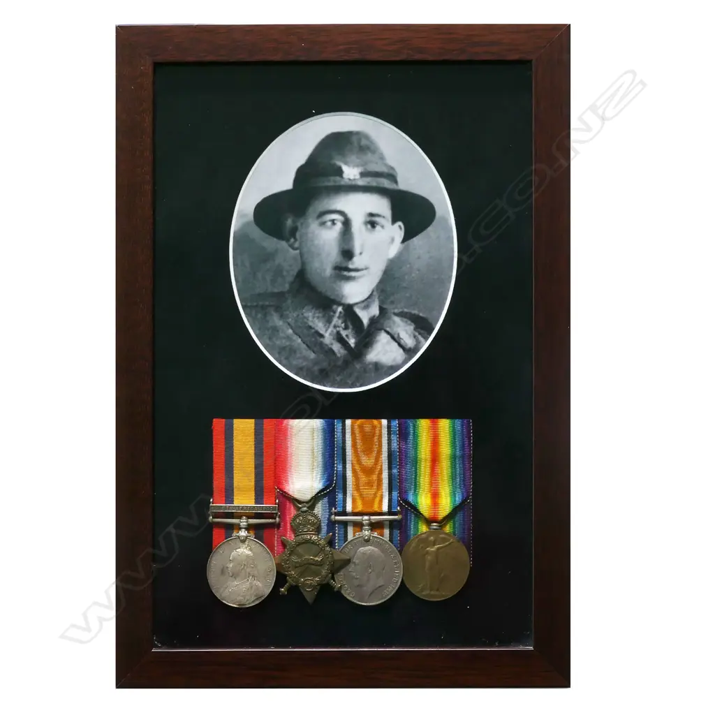 The Boer War and WW1 medals to war to Frederick William Lucas killed on Gallipoli - in a modern frame with a copy photo. QSA 9033 PTE F W LUCAS 10TH NZ CONT. 1914-15 Star and 1914-18 War Medal 13/708 TPR F W LUCAS NZEF. The Victory Medal an erased or un-named filler. Frederick was the manager of the NZ Dairy Assoc creamery at Whangarata and later the creamery at Kaukapakapa. He was killed in action on 8 August 1915 during the attack on Chunuk Bair – aged 32. Image 1++