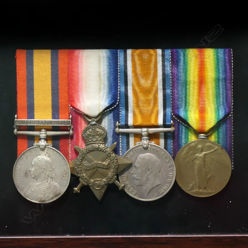 The Boer War and WW1 medals to war to Frederick William Lucas killed on Gallipoli - in a modern frame with a copy photo. QSA 9033 PTE F W LUCAS 10TH NZ CONT. 1914-15 Star and 1914-18 War Medal 13/708 TPR F W LUCAS NZEF. The Victory Medal an erased or un-named filler. Frederick was the manager of the NZ Dairy Assoc creamery at Whangarata and later the creamery at Kaukapakapa. He was killed in action on 8 August 1915 during the attack on Chunuk Bair – aged 32. Image 1++